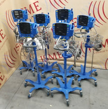 Load image into Gallery viewer, Lot of 6 GE Carescape Dinamap V100 Vital Signs Monitor on Rolling Stands