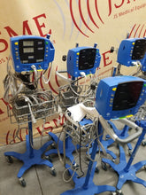 Load image into Gallery viewer, Lot of 6 GE Carescape Dinamap V100 Vital Signs Monitor on Rolling Stands